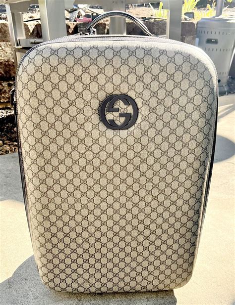 cheap gucci luggage sets|large luggage gucci bag.